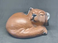 Urna perro durmiente